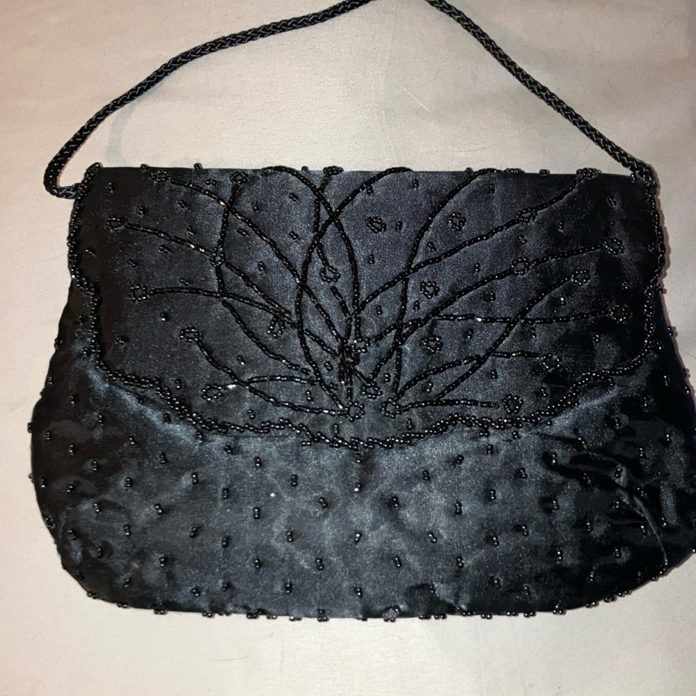 La Regale Ltd black beaded clutch bag